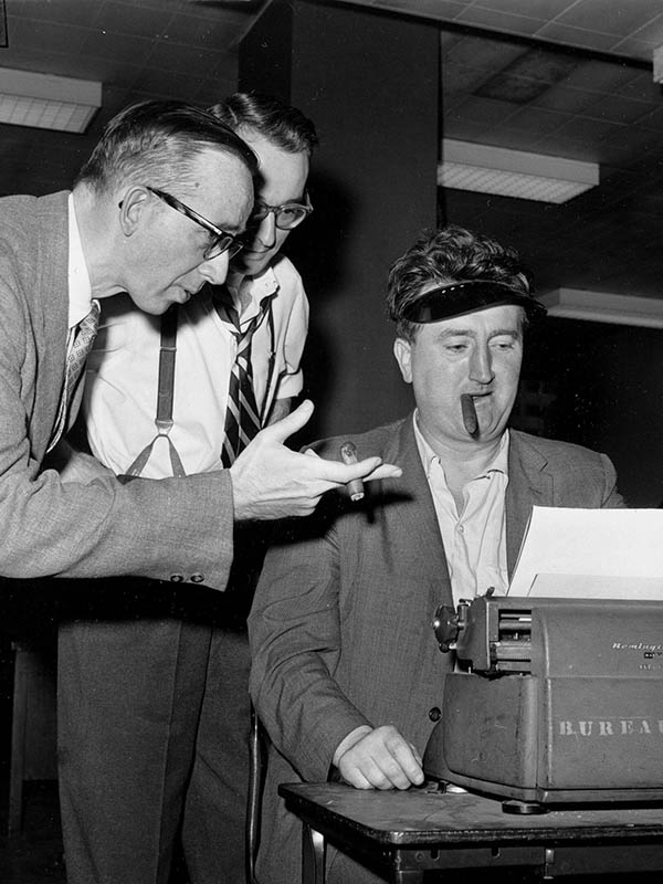 Two men reviewing documents