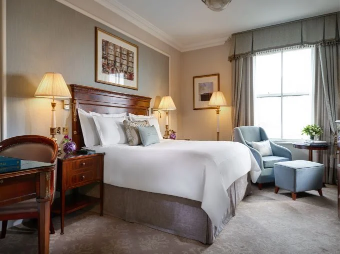 Cozy bedroom with wooden headboard and soft lighting