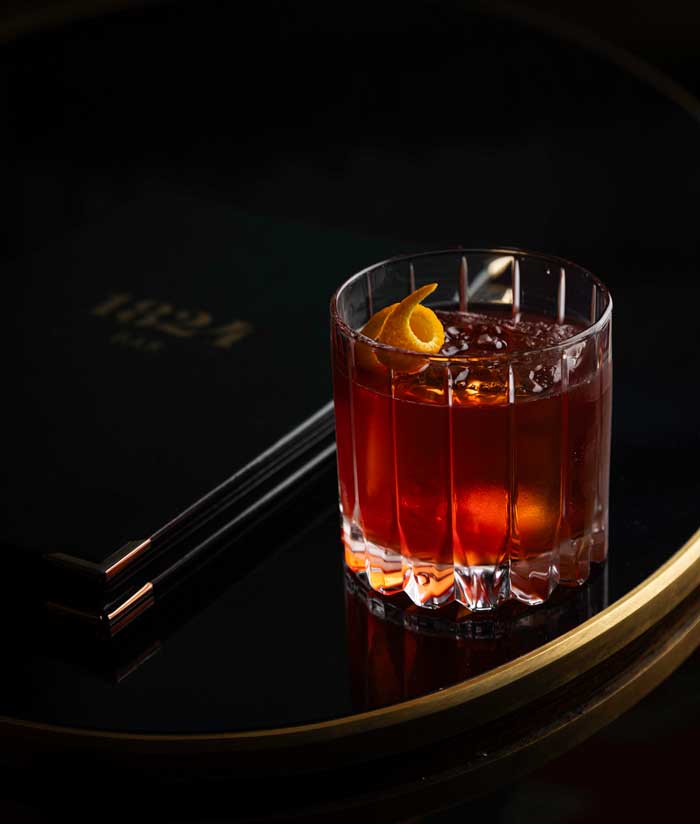 Red cocktail in crystal glass