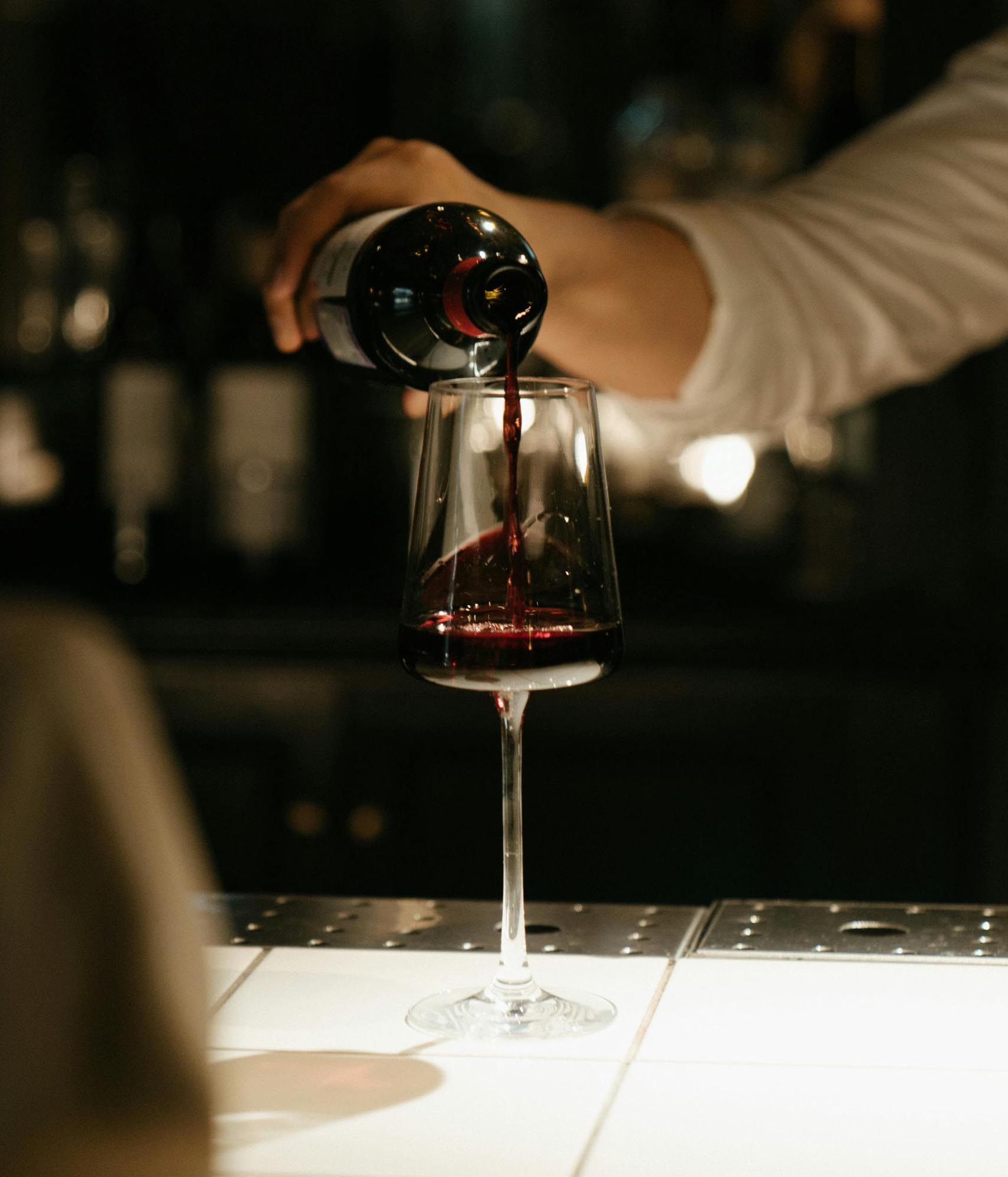 Wine being poured into glass